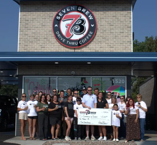 Ribbon cutting celebrated with donation